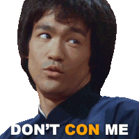 bruce lee says " don 't con me " in orange