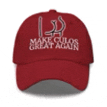 a red baseball cap with the words `` make culos great again '' written on it .