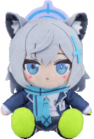 a stuffed animal with a blue scarf around her neck has a badge that says ' a ' on it