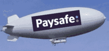 a white zeppelin with the word paysafe on it