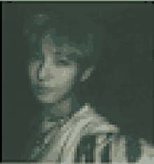 a pixelated image of a person 's face shows a very dark background