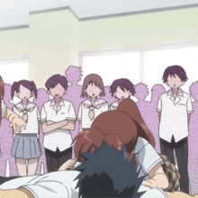 a group of anime characters are standing around a man laying down