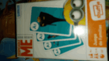 a box of despicable me playing cards with a picture of a minion on it