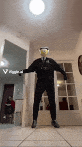 a person wearing a spongebob mask is dancing in a hallway with a viggle.ai sticker