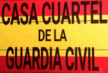 a red and yellow sign that says casa cuartel de la guardia civil