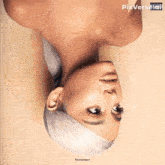 an upside down picture of ariana grande 's sweetener