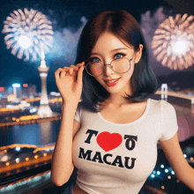 a woman wearing glasses and a white shirt that says i love macau