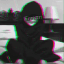 a blurry image of a person wearing a hoodie with the word enough written on it