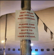 a sign on a pole says tent poles are not for pole dancing please find alternative ways to disappoint your father