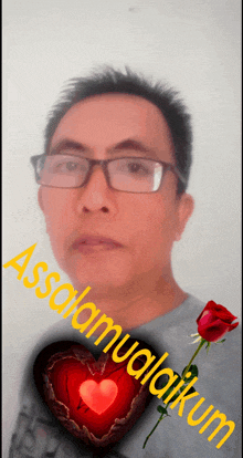 a man wearing glasses and a red heart with the words assalamualaikum on it