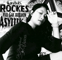 a black and white photo of a woman wearing a shirt that says the brotherhood voices on it