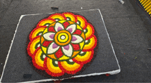 a colorful circular design made out of flowers