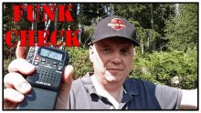 a man holding a walkie talkie with the words funk check on the bottom