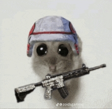 a mouse wearing a helmet and holding a gun