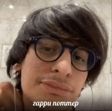 a close up of a man wearing glasses and ear buds with a caption that says zappu pommer