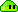 a pixel art drawing of a green object with two eyes on a white background .