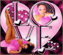 a woman in a pink dress is laying on her stomach in front of a pink heart .