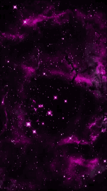 a purple galaxy with lots of stars and purple smoke