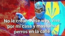 a wrestler in a blue mask is pointing at the camera with a phrase in spanish .