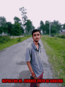 a young man stands on the side of a road with the caption nepali ho ni