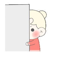 a girl in a red shirt is peeking behind a white wall