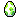 a pixel art of a green and white egg on a white background