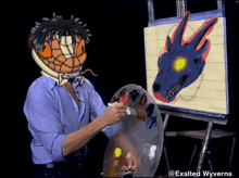 a man is painting a picture of a dragon with the words exalted wyverns written on the bottom