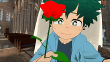 a boy is holding a red rose in a church .