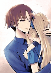 a man and a woman are hugging each other in a anime .