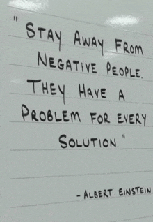 a quote from albert einstein is written on a white board