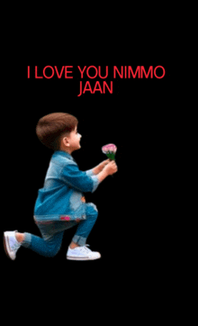 a little boy is kneeling down and holding a flower with the words i love you nimo jaan written above him