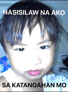 a picture of a baby with the words nasisilaw na ako sa katangan mo