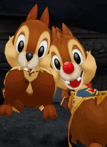 two chipmunks are standing next to each other with their hands on their faces