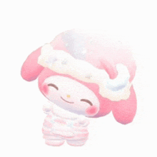 a pink stuffed animal wearing a hat and pajamas is smiling .