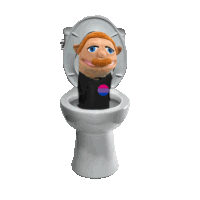 a puppet is sitting in a toilet with the lid up