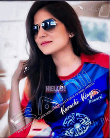 a woman wearing sunglasses and a shirt that says karachi kings on it