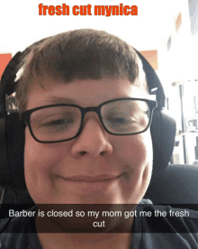 a boy wearing glasses and headphones is smiling with the caption fresh cut mynica above him