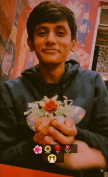 a young man holding a bouquet of flowers in front of a coca cola advertisement