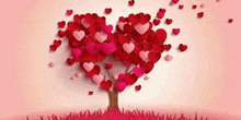 a tree made of hearts on a pink background