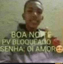 a blurry picture of a boy with the words boa noite pv bloqueado senha oi amor written on it