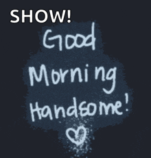 a sign that says show good morning handsome with a heart