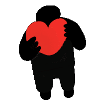 a silhouette of a person holding a red heart in their hands