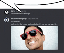 a man wearing red sunglasses is smiling in a discord message