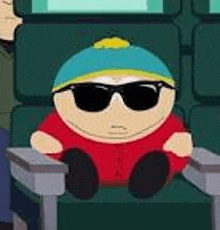 a cartoon character is sitting in a chair wearing sunglasses and a hat .