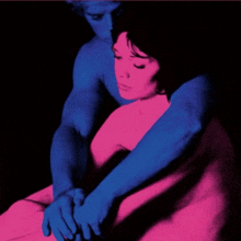 a man and a woman are hugging each other in a blue and pink painting