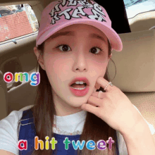 a girl wearing a pink hat with the words " omg a hit tweet " below her