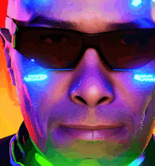 a close up of a man 's face with sunglasses and a rainbow background