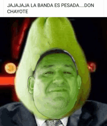 a picture of a man with a pear on his head with the caption jajaja la banda es pesada don chayote