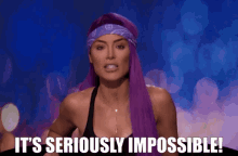 a woman with purple hair and a bandana on her head says it 's seriously impossible