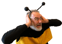 a man wearing a bee costume covering his ears